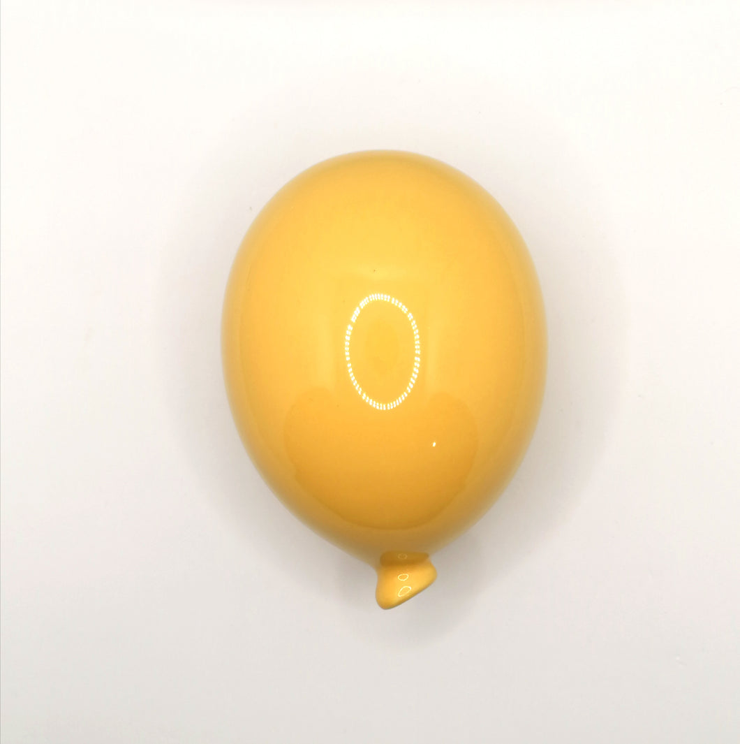 Yellow ceramic balloon