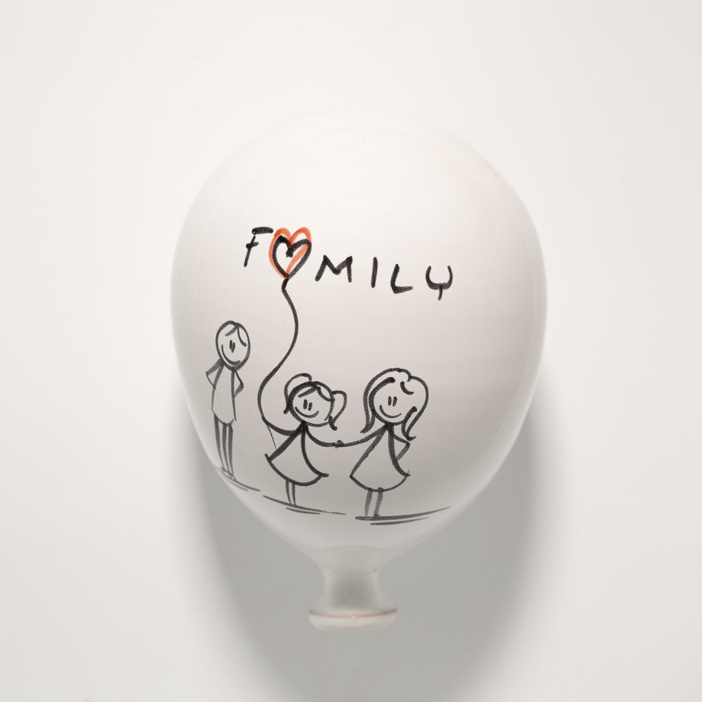 Family balloon with little girl